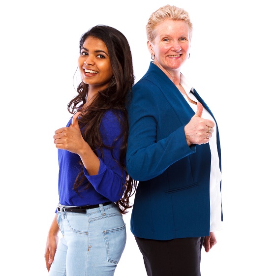 Two women standing back to back. They have their thumbs up and are smiling.