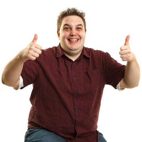 A man smiling with both thumbs up