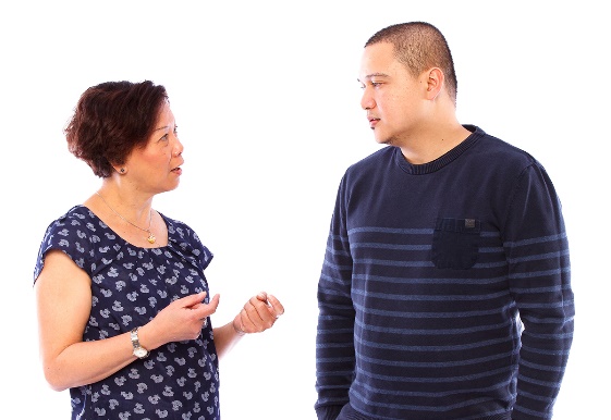 A man and a woman talking