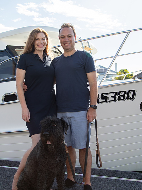 An image of Ashleigh smiling in her home.