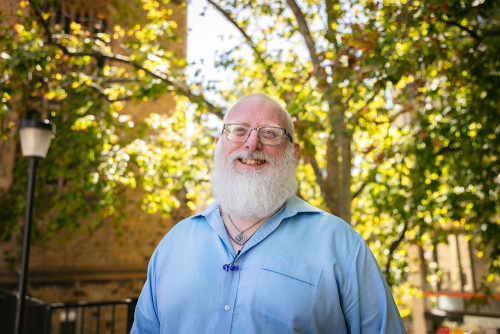 An image of Loki smiling outdoors