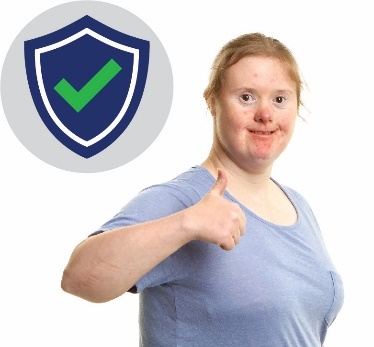 Woman smiling with thumbs up and a safety icon