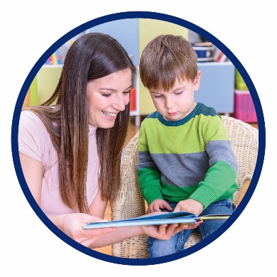 A woman and a boy reading a book