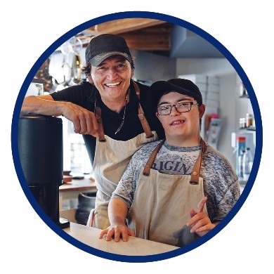 A manager and a worker in a cafe