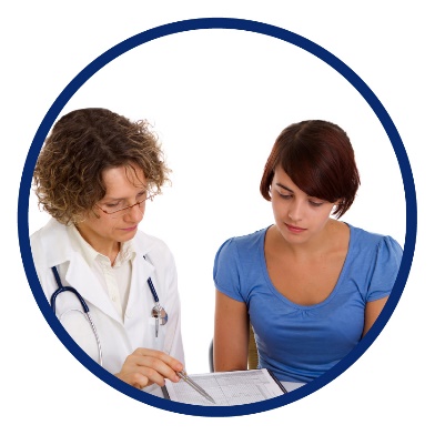 A doctor showing a woman a document