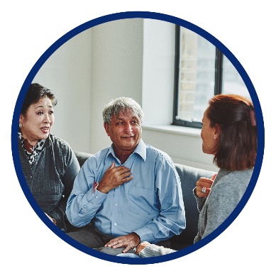 A man and a woman talking to an advocate