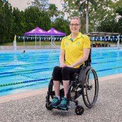 Ms Rachel Watson (photographed in her wheel chair by a swimming pool) 